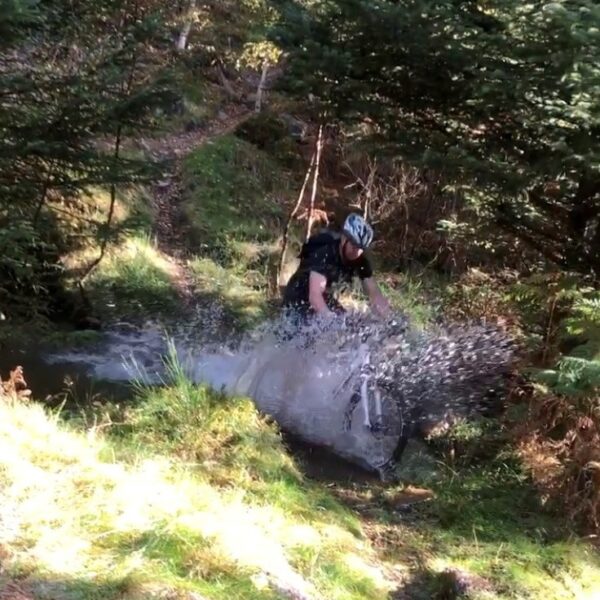 Splashing through a puddle at Comrie