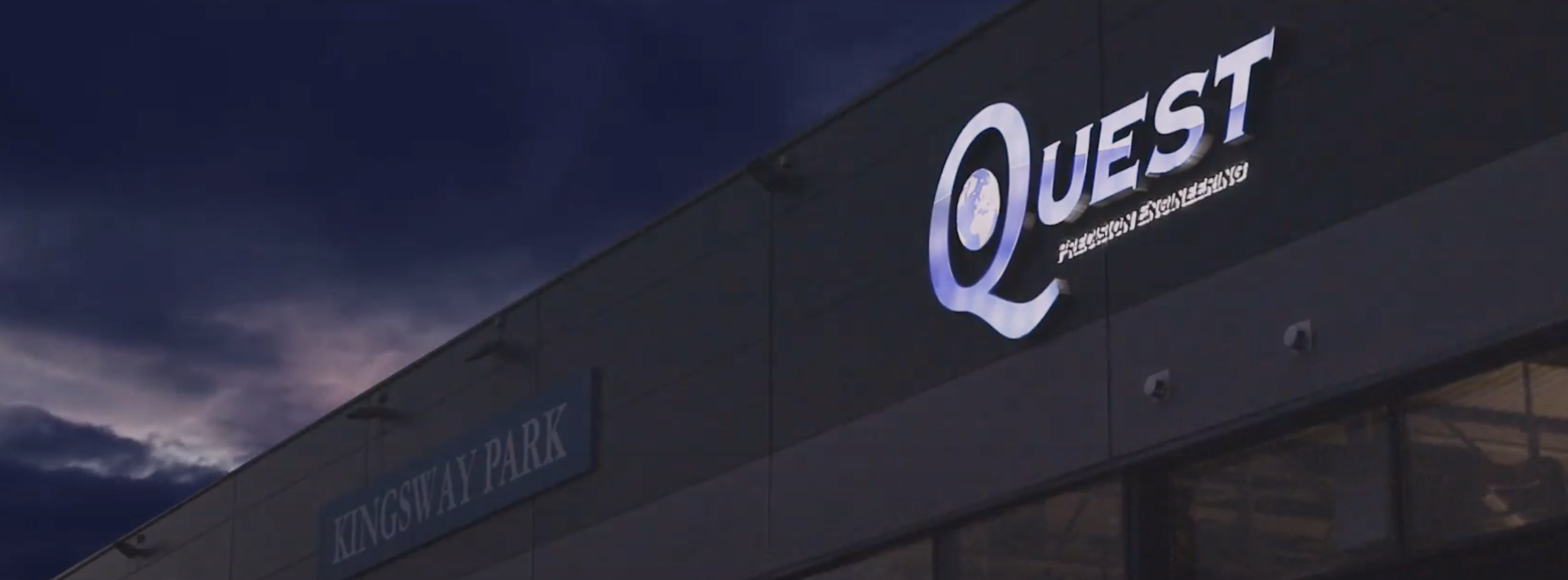 Quest logo lit up in the dark